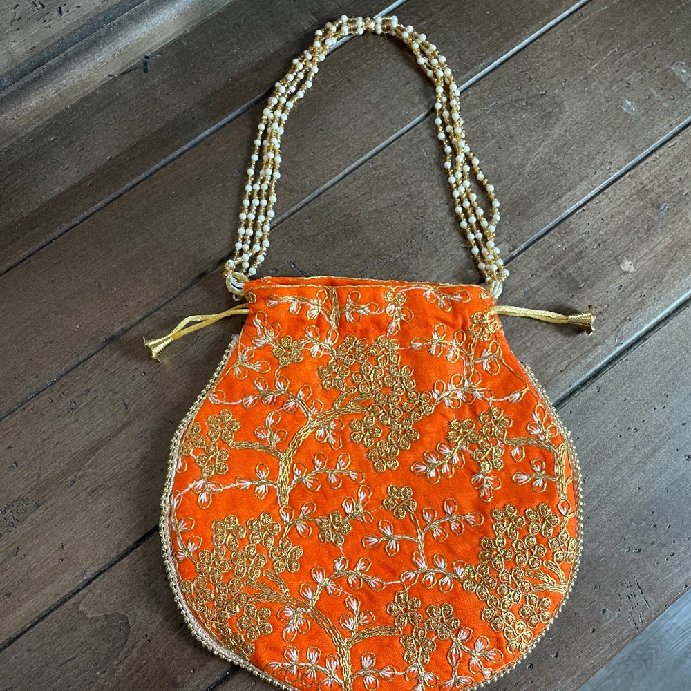 Embroidery floral clutch